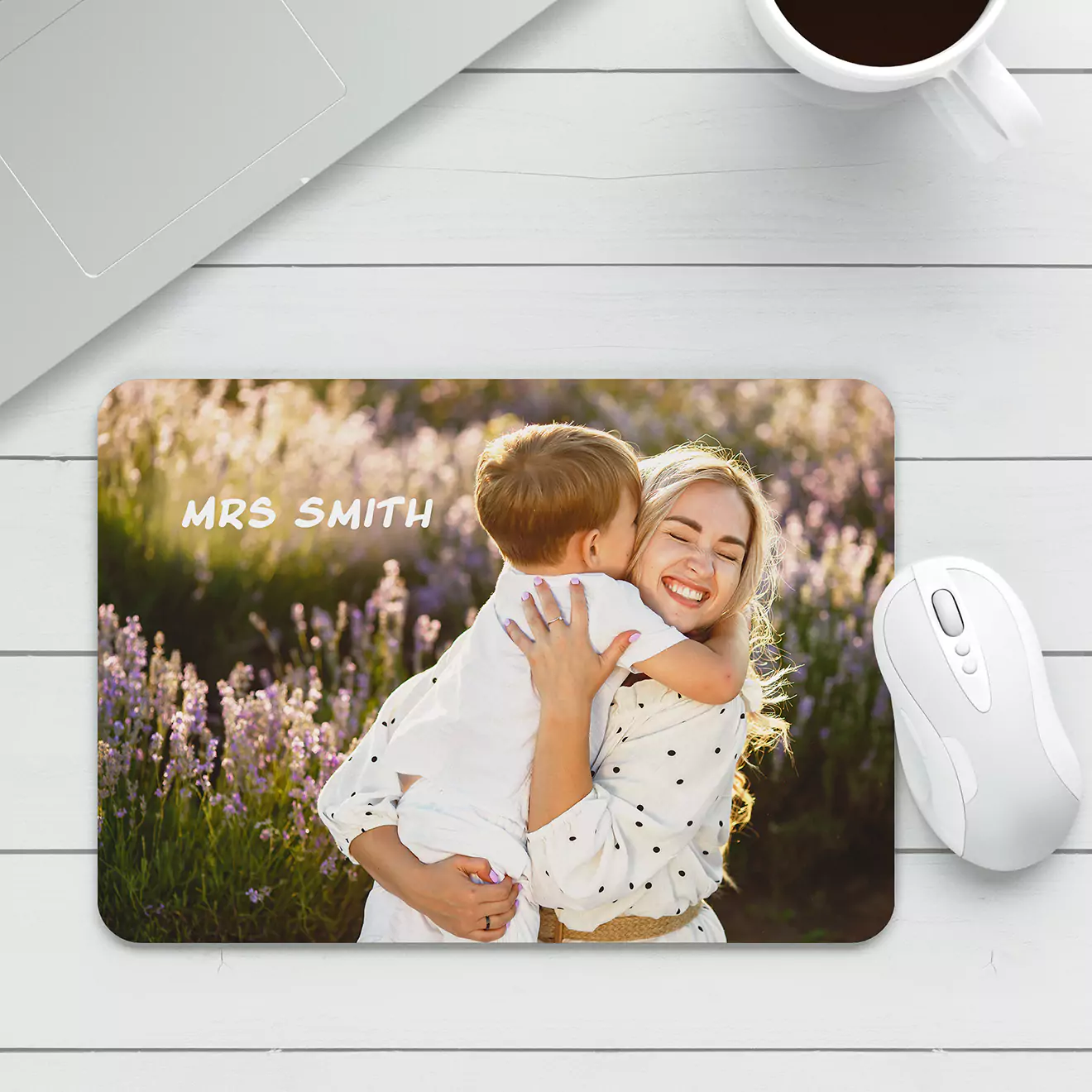 Mouse pad featuring a touching photo of a teacher hugging a child, adding a personal and heartwarming touch to your workspace, perfect for educators and school staff.