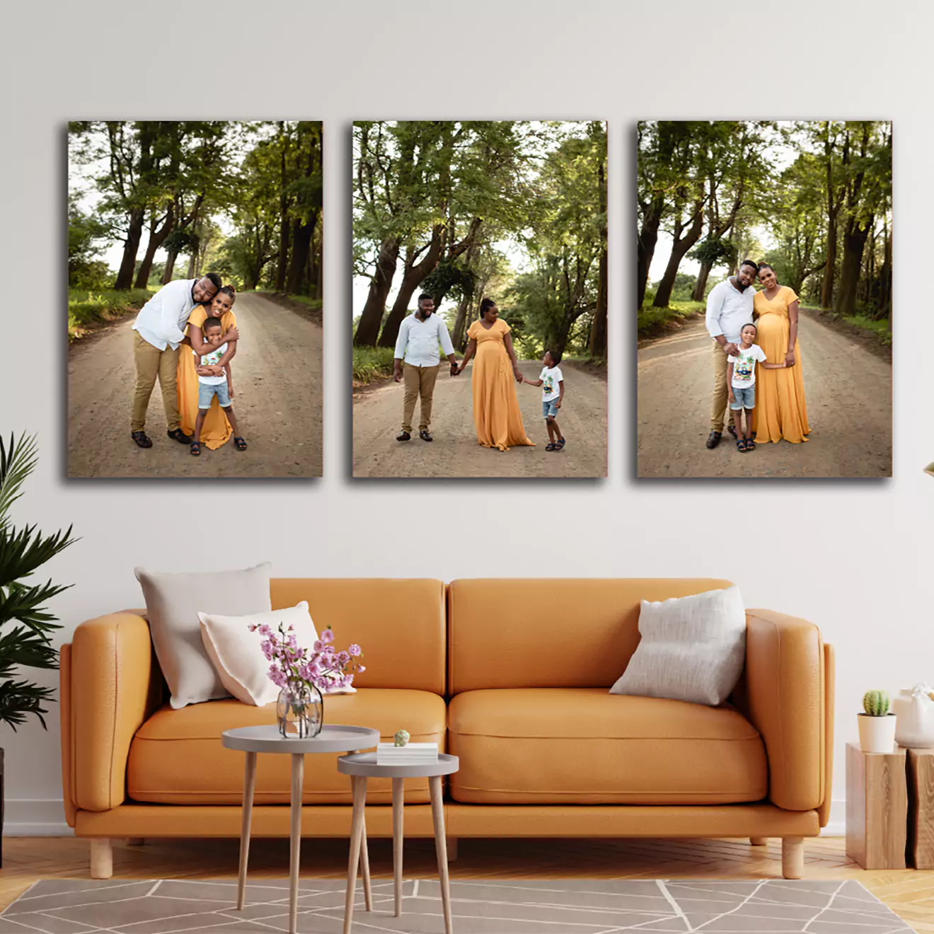 Set of 3 canvas prints on a wall in a room, featuring a young family on a tree-lined road, capturing a heartwarming moment in a beautifully arranged triptych display.