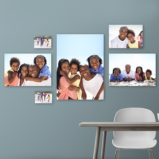 Set of 6 canvas prints on a wall in a room, featuring a family with a mom, dad, and their two children (pigeon pair) smiling and having fun, beautifully arranged to capture joyful moments.