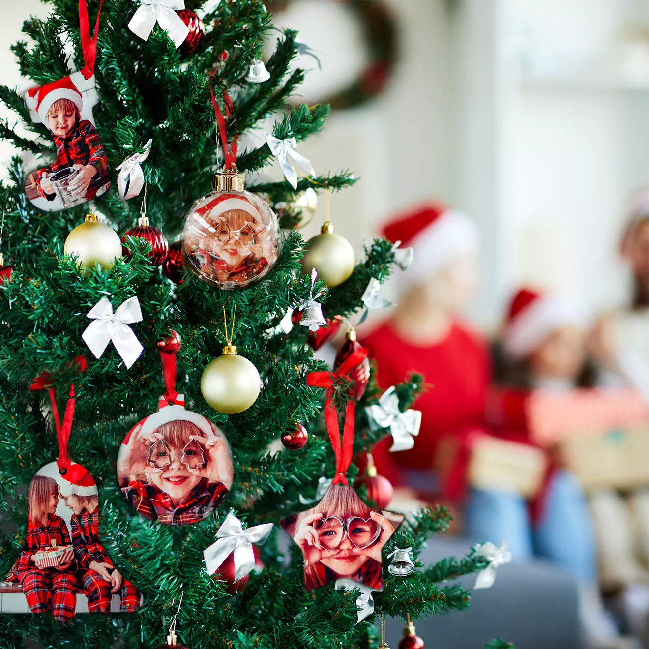 Assortment of personalised Christmas decorations hanging on a festive tree, each uniquely designed to add a special touch to holiday decor, capturing the warmth and joy of the season.