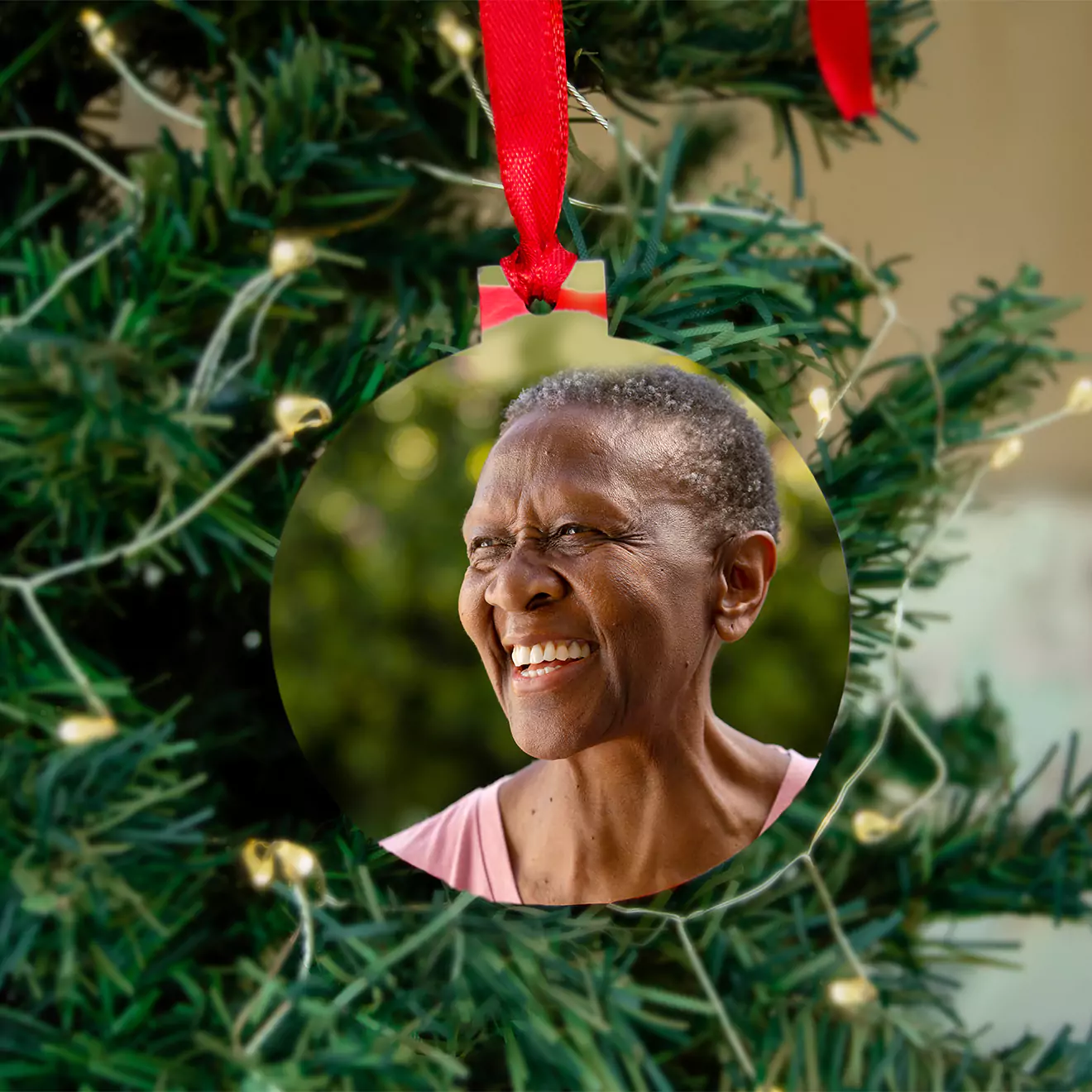 Christmas decoration featuring a heartwarming scene of a mom and her baby decorating a tree, perfectly capturing the joy and togetherness of the holiday season.