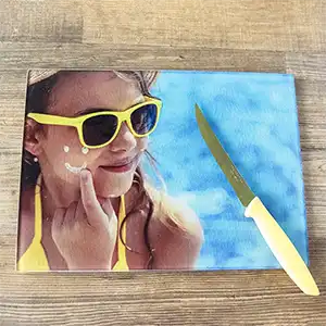 Personalised cutting board featuring a vibrant print of a child next to a pool, capturing the joyful essence of summer days and adding a splash of colour to your kitchen decor.