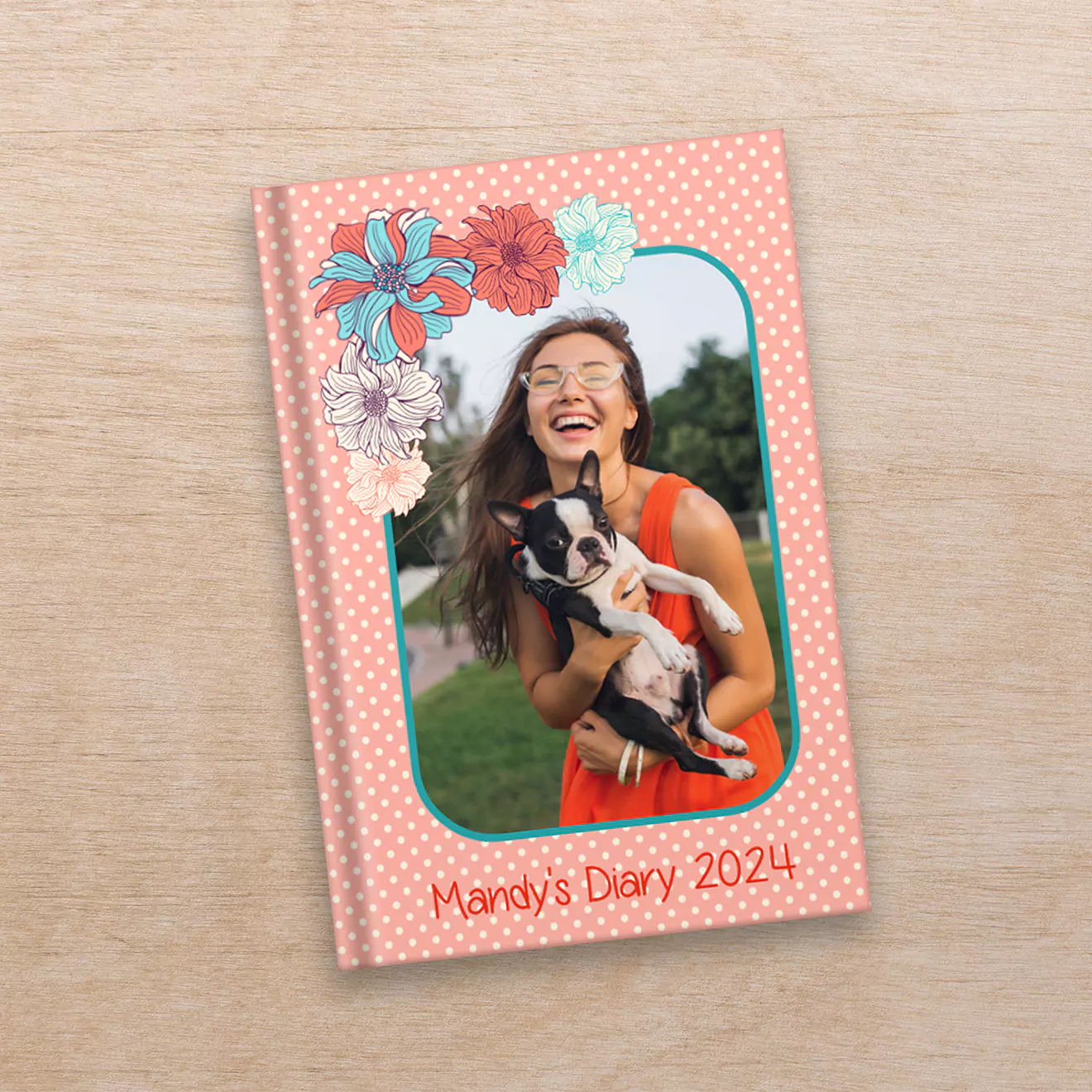 Personalised diary from RapidStudio resting on a desk, featuring a custom cover with a photo of a child, ideal for organising daily activities while keeping treasured memories close.