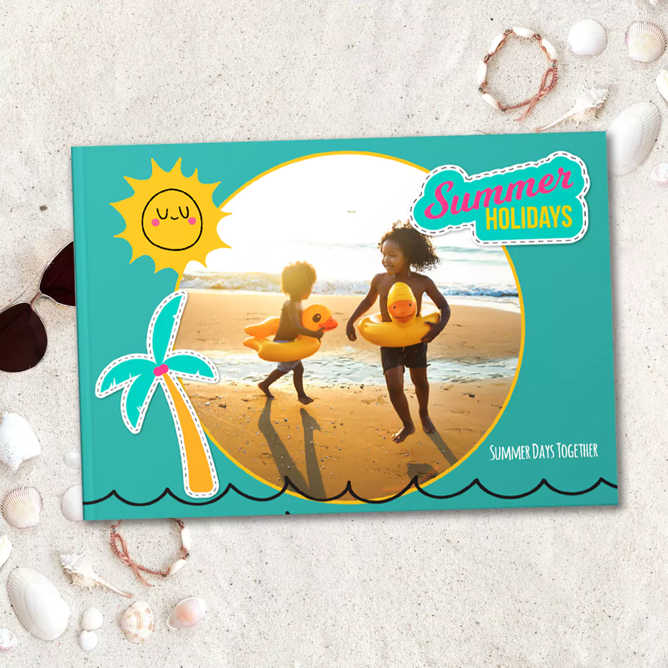 Summer holiday photobook open to a vibrant beach scene with children playing. Colourful and lively, ideal for preserving family vacation memories.