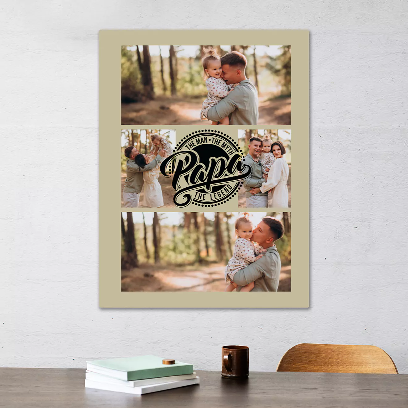 Custom wall art canvas collage featuring three family photos with a father and child in an outdoor setting. The central photo includes the text 'Papa, The Man, The Myth, The Legend.' Mounted on a beige background, displayed above a desk with books and a cup.