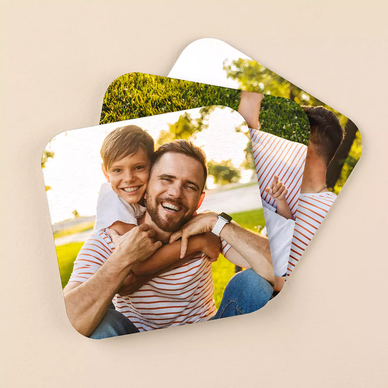 A set of colourful, personalised coasters featuring vibrant, high-quality photos. The coasters showcase images of a smiling baby and playful scenes, making them ideal as unique gifts for various occasions such as baby showers, birthdays, or Christmas. Perfect for adding a personal touch to home decor.