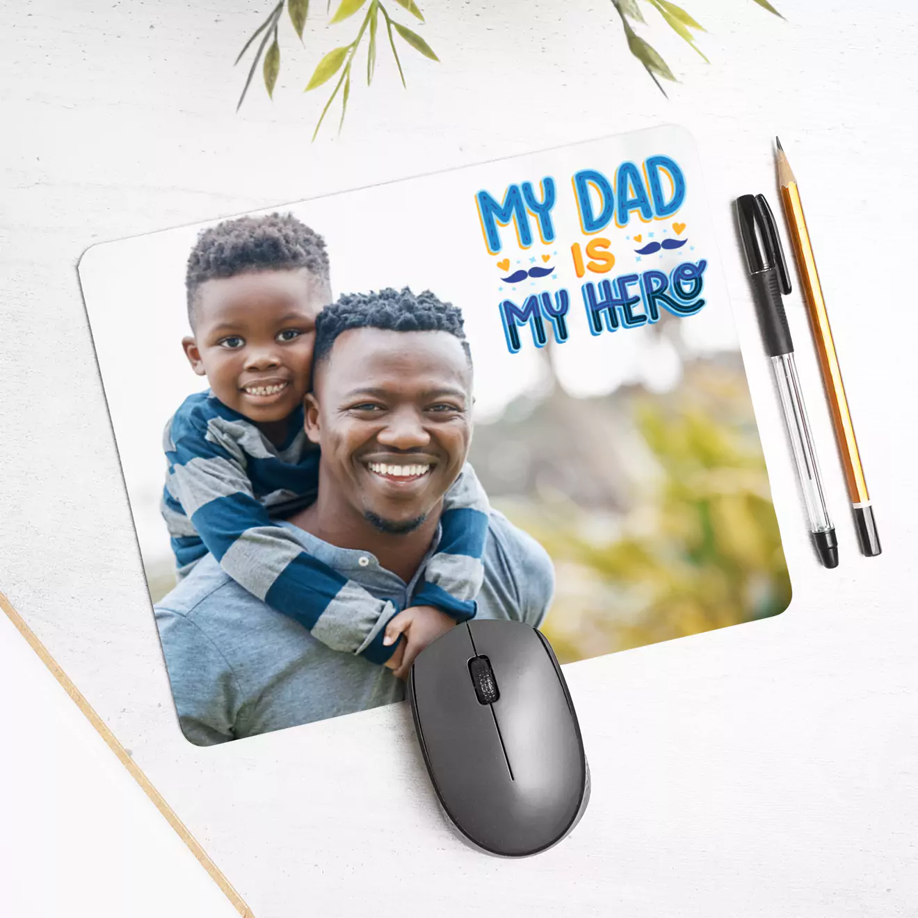 Rectangular personalised mousepad featuring a joyful image of a man carrying a child on his shoulders, set against a natural outdoor background. Ideal for gifts for men, Christmas gift ideas, or personalised gifts in South Africa. Perfect for adding a personal touch to a workspace.