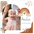 A boho-themed birthday collage featuring a smiling baby girl in a pink dress and headband. The design includes earthy tones, rainbows, and leaf motifs, with the text "Amilia my first birthday" in a stylish font. Ideal for personalised gifts, photo albums, and baby shower gift ideas.