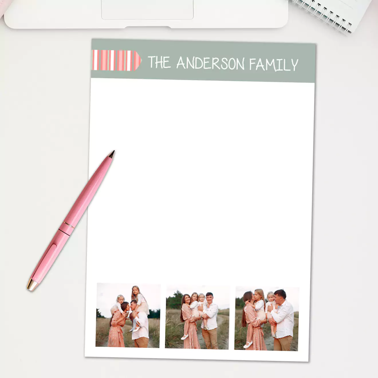 Personalised family-themed notepad featuring the text "The Anderson Family" at the top with a striped design. The notepad includes three family photos at the bottom and ample white space for notes. Ideal for gifts, including Christmas and baby showers.