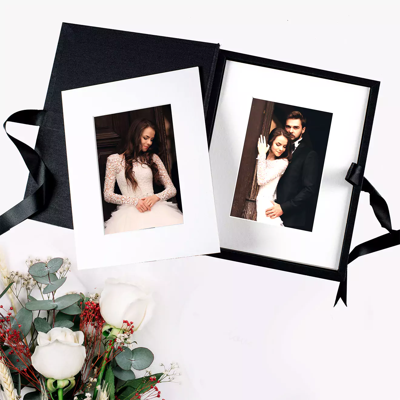 Image of a personalised folio box from RapidStudio, elegantly housing a collection of mounted photo prints, ideal for showcasing professional portfolios or cherished memories.