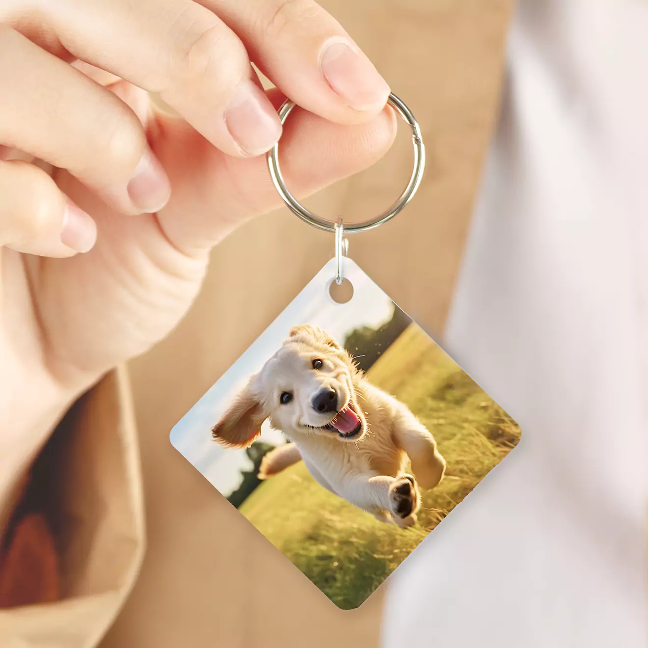 Beeld van gepersonaliseerde sleutelrings van RapidStudio, met aangepaste foto's om gekoesterde herinneringe waar jy ookal gaan te dra.