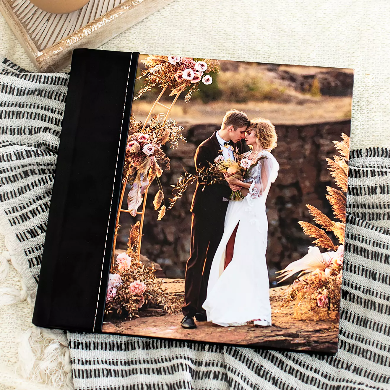 Image of a handcrafted album from the Ultimate Designer Album Collection, featuring a wedding couple on the cover, showcasing elegant and custom design perfect for preserving special matrimonial memories.