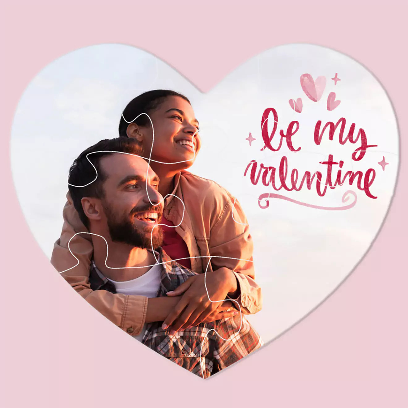 Heart-shaped photo puzzle featuring a joyful couple outdoors, with the woman playfully piggybacking on the man. The puzzle pieces are arranged to form a heart, making it a perfect personalised gift for occasions like Valentine's Day, anniversaries, or birthdays. Ideal for creating memorable keepsakes.