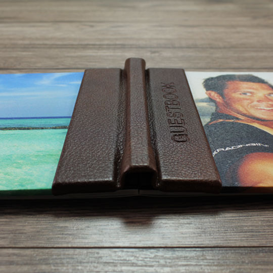 Personalised photo book with a brown leather cover, featuring vibrant images on the front. Ideal for gifts for men, Christmas gift ideas, or photo albums. Perfect for preserving cherished memories.