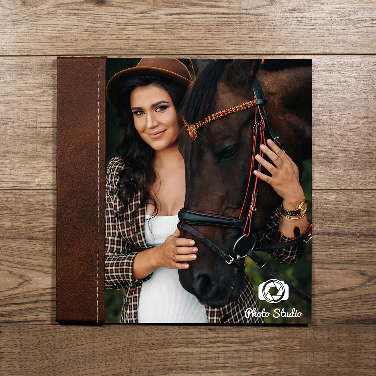 Personalised photo book with a brown leather spine and a cover featuring a woman in a hat posing with a horse. The background is a wooden surface, giving a rustic feel. Ideal for creating custom photo albums, gifts for her, or unique Christmas gift ideas.