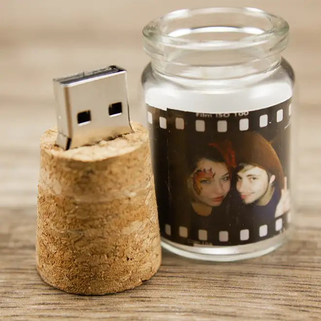 Personalised USB drive with cork stopper, presented in a small glass jar featuring a custom photo film strip design. Ideal as a unique gift for men, Christmas gift, or Valentine''s Day gift. Perfect for storing digital photo albums or as a thoughtful baby shower gift idea.