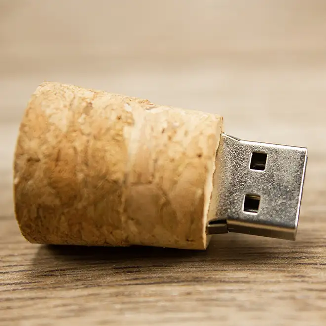 A unique USB flash drive with a cork design, blending rustic aesthetics with modern technology. The cork material gives it a natural, earthy look, making it a distinctive and eco-friendly gift option. Ideal for personalised gifts, Christmas gift ideas, or gifts for men.