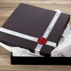 Elegant black gift box with white ribbon and red wax seal, perfect for personalised gifts, photo albums, or special occasions like Christmas, Valentine's Day, and baby showers.